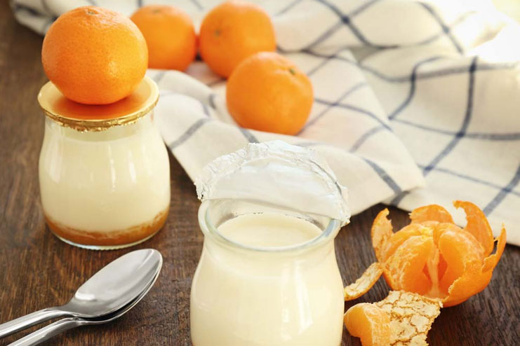 Orange peel turmeric powder and yogurt