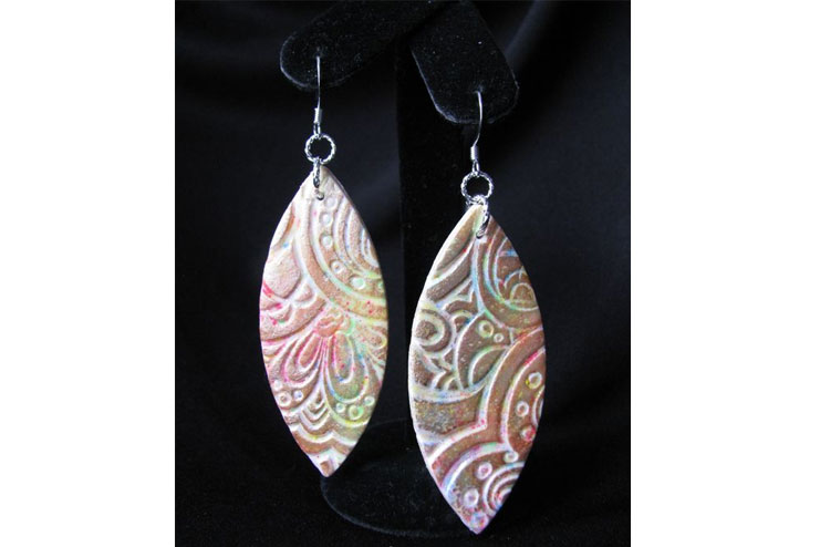 Carved clay earrings
